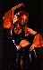 picture of Jacqueline in purple/orange cabaret costume